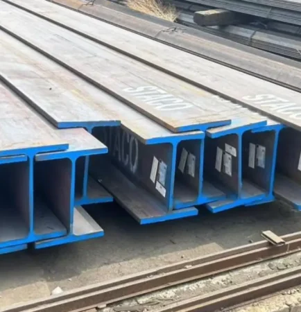 H beam structural steel sections stacked at warehouse for construction and industrial projects