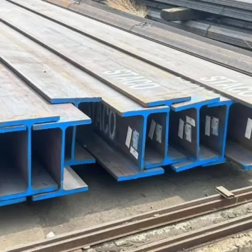 H beam structural steel sections stacked at warehouse for construction and industrial projects